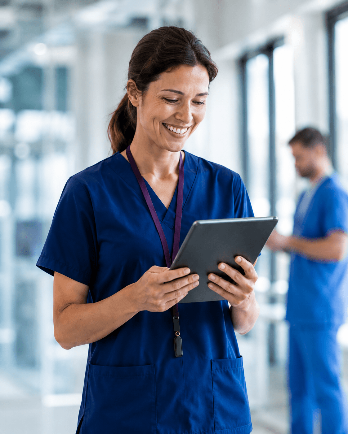 Healthcare worker using a tablet